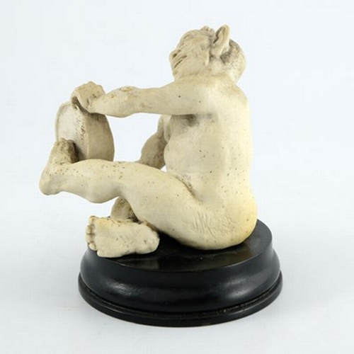 852 - Robert Wallace Martin for Martin Brothers, a stoneware musical imp figure, 1893, modelled playing th... 