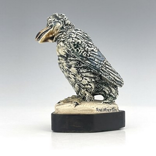 854 - Robert Wallace Martin for Martin Brothers, a miniature stoneware Barrister bird sculpture, 1913, mod... 