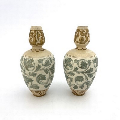 858 - Ada Dennis for Doulton Lambeth, a pair of painted stoneware vases, double gourd form, decorated with... 