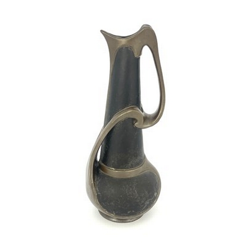 859 - A Bretby Arts and Crafts metallic strap jug, globe and cone form with tendril strap handle, in the J... 