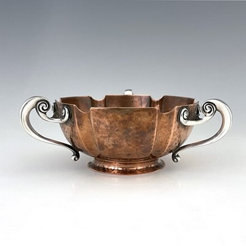 86 - An Arts and Crafts silver handled copper bowl, William Hutton and Sons, Sheffield circa 1905, planis... 