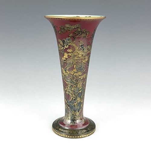 866 - Daisy Makeig-Jones for Wedgwood, a Fairyland lustre trumpet vase, Firbolgs IV with fish interior rim... 