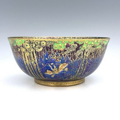 872 - Daisy Makeig-Jones for Wedgwood, a Fairyland lustre Imperial bowl, the interior decorated in the Jum... 