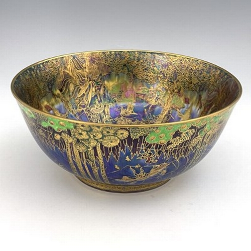 872 - Daisy Makeig-Jones for Wedgwood, a Fairyland lustre Imperial bowl, the interior decorated in the Jum... 