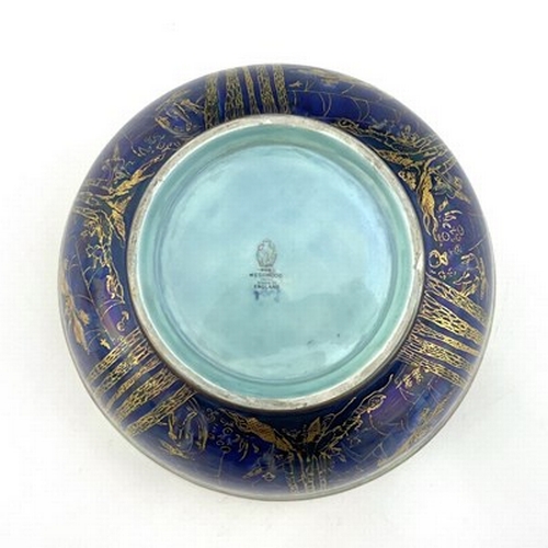 872 - Daisy Makeig-Jones for Wedgwood, a Fairyland lustre Imperial bowl, the interior decorated in the Jum... 