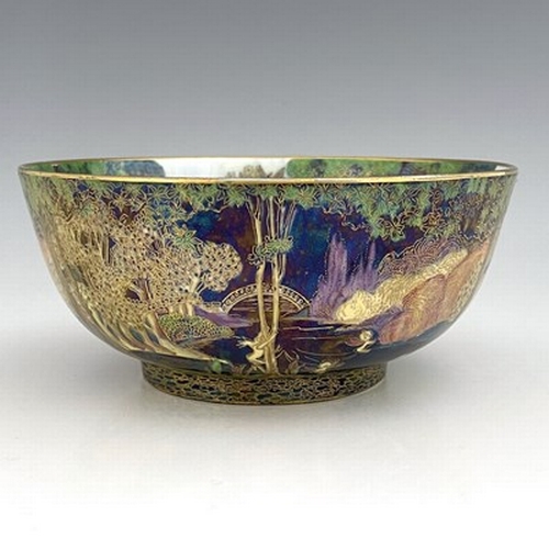 873 - Daisy Makeig-Jones for Wedgwood, a Fairyland lustre Imperial bowl, Picnic by a River interior, the e... 