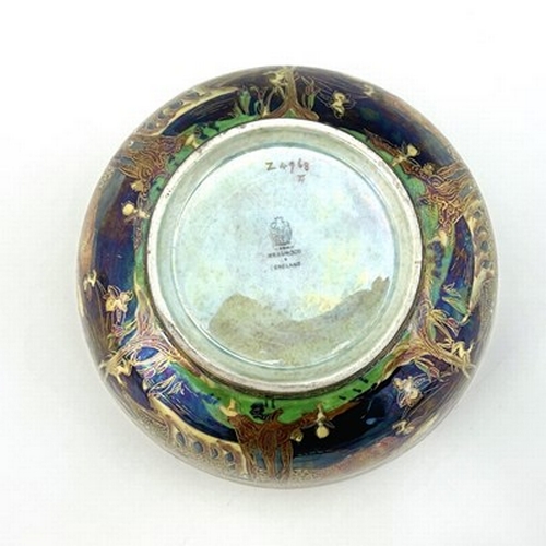 873 - Daisy Makeig-Jones for Wedgwood, a Fairyland lustre Imperial bowl, Picnic by a River interior, the e... 