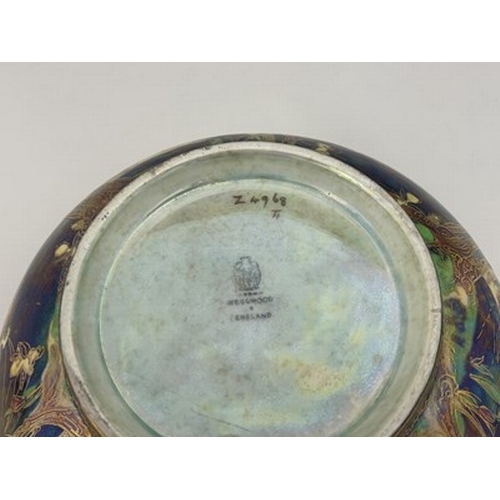 873 - Daisy Makeig-Jones for Wedgwood, a Fairyland lustre Imperial bowl, Picnic by a River interior, the e... 