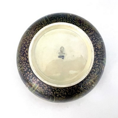 876 - Daisy Makeig-Jones for Wedgwood, a Fairyland lustre Imperial bowl, Woodland Elves III, Feathered Hat... 