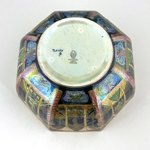 877 - Daisy Makeig-Jones for Wedgwood, a Fairyland lustre octagonal bowl, Smoke Ribbons interior, the exte... 