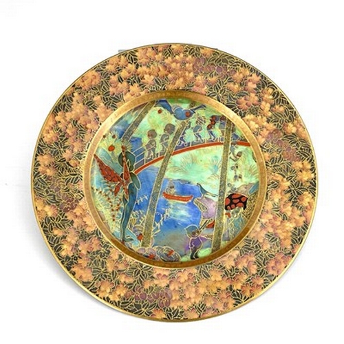 879 - Daisy Makeig-Jones for Wedgwood, a Fairyland lustre plate, Imps on a Bridge and Tree House, with ver... 