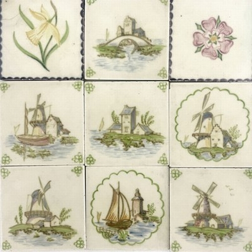 884 - A set of five Pilkingtons tiles, painted with Dutch Windmills and houses, one pencil marked 'Artist'... 