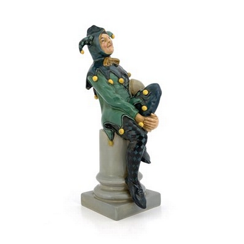 886 - Charles Noke for Royal Doulton, The Jester, figure HN 71, number 18, modelled on a column, green and... 