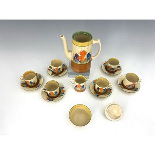 887 - Clarice Cliff for Wilkinson and Newport Pottery, a Crocus pattern coffee set, including coffee pot, ... 