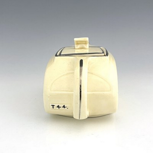 890 - A Sadler At Deco novelty teapot, modelled as a bus, cream glaze, moulded marks