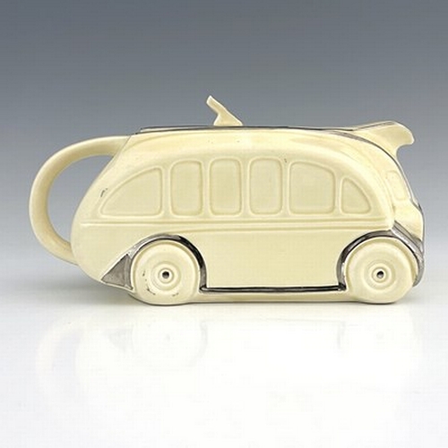 890 - A Sadler At Deco novelty teapot, modelled as a bus, cream glaze, moulded marks