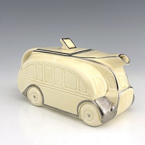 890 - A Sadler At Deco novelty teapot, modelled as a bus, cream glaze, moulded marks