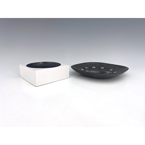 894 - Simone Killburn for Troika, an art pottery dish, cuboid form with circular concave centre, together ... 