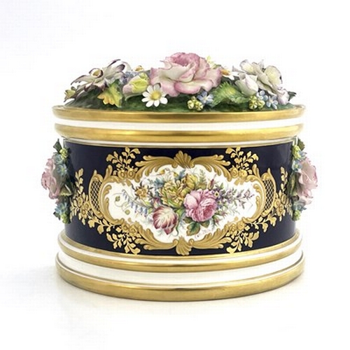 896 - Stefan Nowacki for Lynton Porcelain, a demi-lune bough pot and cover, the lid encrusted with roses, ... 