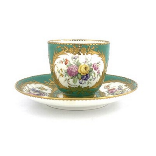 900 - A Minton floral painted and raised paste gilt coffee cup and saucer, circa 1850, in the Sevres style... 