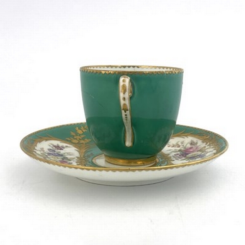 900 - A Minton floral painted and raised paste gilt coffee cup and saucer, circa 1850, in the Sevres style... 