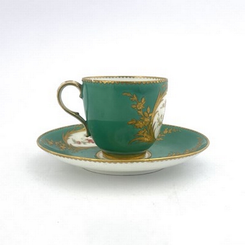 900 - A Minton floral painted and raised paste gilt coffee cup and saucer, circa 1850, in the Sevres style... 