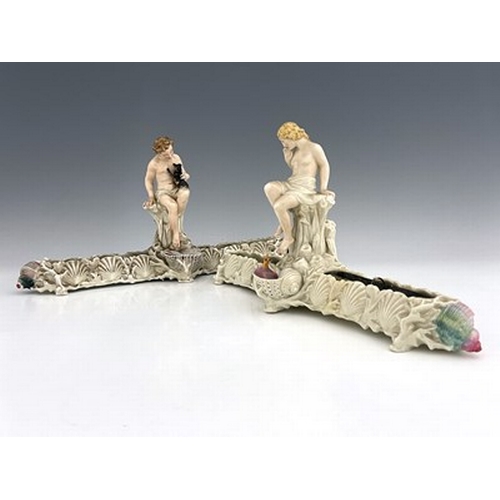 904 - A pair of Royal Worcester pearlescent lure figural centrepiece vases, each with a nymph type figure ... 