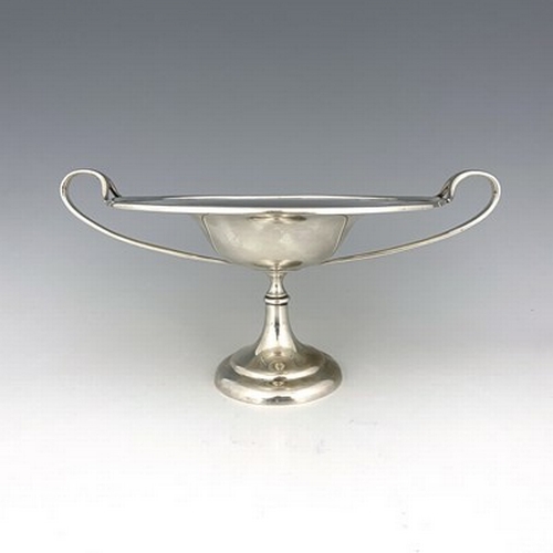 91 - A Scottish Arts and Crafts silver comport, Brook and Son, Edinburgh 1908, the shallow ogee bowl with... 