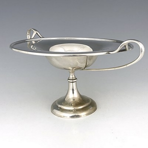 91 - A Scottish Arts and Crafts silver comport, Brook and Son, Edinburgh 1908, the shallow ogee bowl with... 