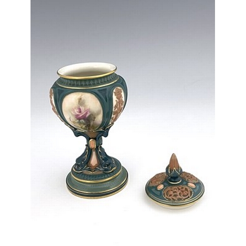 910 - A Hadley's Worcester flower painted pedestal vase, circa 1905, lobed form, painted with floral studi... 