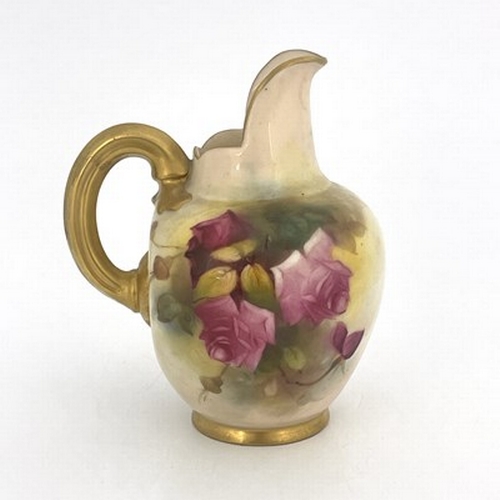 911 - A Royal Worcester rose painted flat back jug,