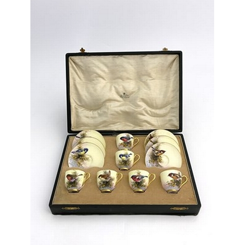 915 - E Barker for Royal Worcester, a bird painted coffee set, decorated with English garden birds, includ... 