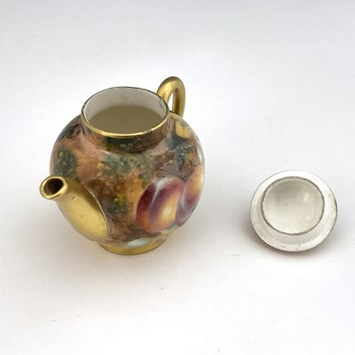 917 - Roberts for Royal Worcester, a miniature fruit painted teapot, signed and printed marks, 6.5cm high