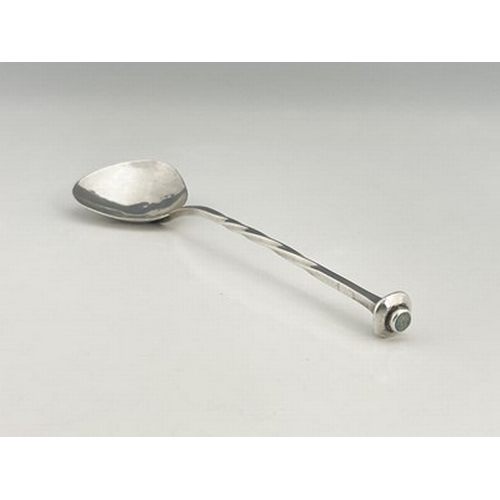 92 - A E Jones, an Arts and Crafts silver spoon, Birmingham 1907, triangular planished bowl on a square s... 