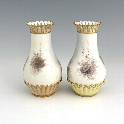 922 - James Stinton for Royal Worcester, a pair of pheasant painted vases, 1904, baluster form, relief mou... 