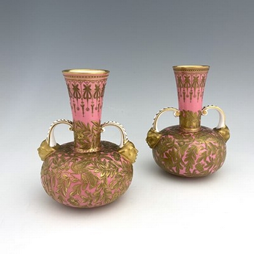 929 - A pair of Royal Crown Derby Aesthetic Movement twin handled vases, circa 1880, squat bulbous form, t... 