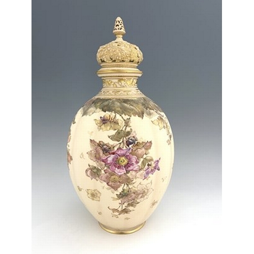 930 - A large Royal Crown Derby blush ivory vase and cover, 1895, lobed ovoid form, painted with dog roses... 