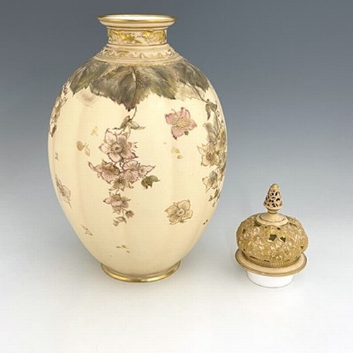 930 - A large Royal Crown Derby blush ivory vase and cover, 1895, lobed ovoid form, painted with dog roses... 