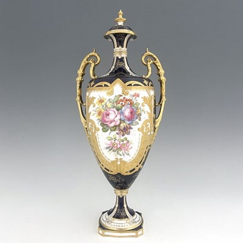 946 - Albert Gregory for Royal Crown Derby, a twin handled floral painted vase and cover, 1920, pedestal u... 