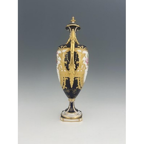 946 - Albert Gregory for Royal Crown Derby, a twin handled floral painted vase and cover, 1920, pedestal u... 