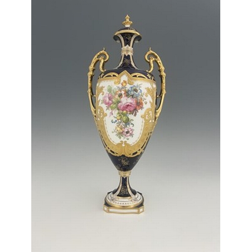 946 - Albert Gregory for Royal Crown Derby, a twin handled floral painted vase and cover, 1920, pedestal u... 