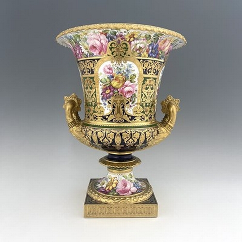 948 - Albert Gregory for Royal Grown Derby, a large floral painted Campana Urn vase, 1904, decorated with ... 