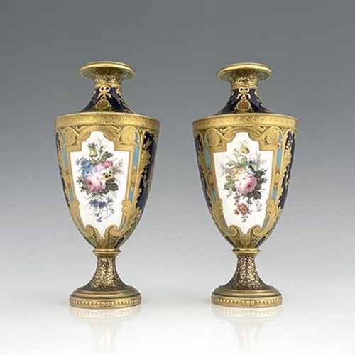 949 - Desire Leroy for Royal Crown Derby, a pair of floral painted vases, 1901, shouldered pedestal urn fo... 