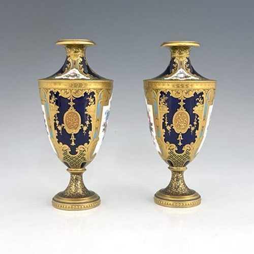 949 - Desire Leroy for Royal Crown Derby, a pair of floral painted vases, 1901, shouldered pedestal urn fo... 