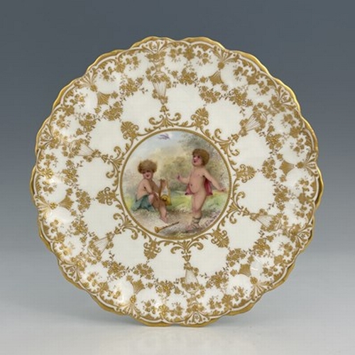 952 - H Boullemier for Royal Doulton, a painted cabinet plate, cherubs at rest, within a raised gilt folia... 