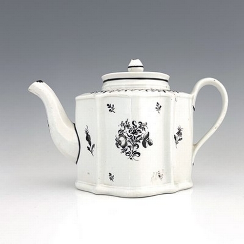 958 - A New Hall porcelain teapot, circa 1780, pattern 133, of small proportions, silver shape, 20cm long