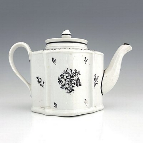 958 - A New Hall porcelain teapot, circa 1780, pattern 133, of small proportions, silver shape, 20cm long