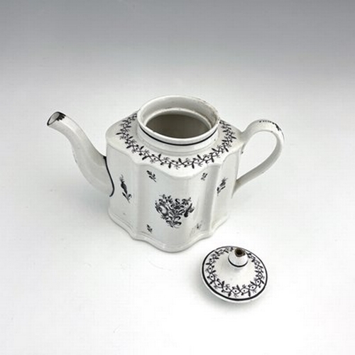 958 - A New Hall porcelain teapot, circa 1780, pattern 133, of small proportions, silver shape, 20cm long