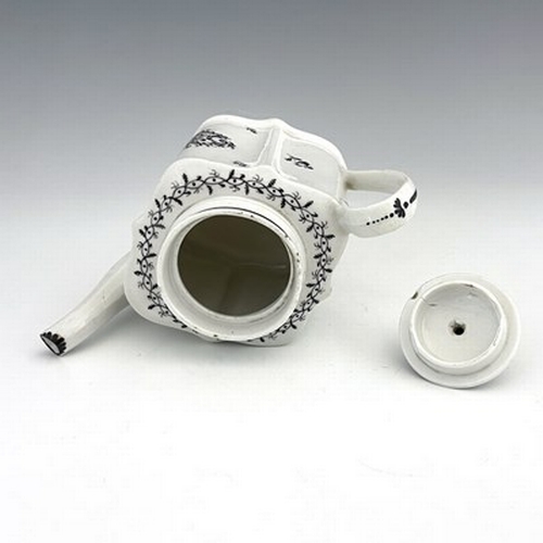 958 - A New Hall porcelain teapot, circa 1780, pattern 133, of small proportions, silver shape, 20cm long