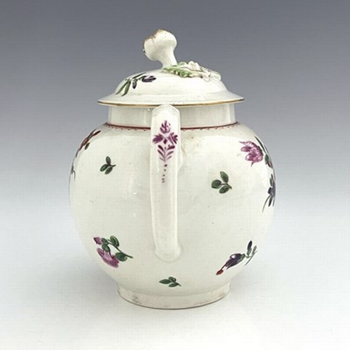 968 - A Worcester polychrome teapot and cover, circa 1765, painted in the Back to Back Floral pattern, sph... 